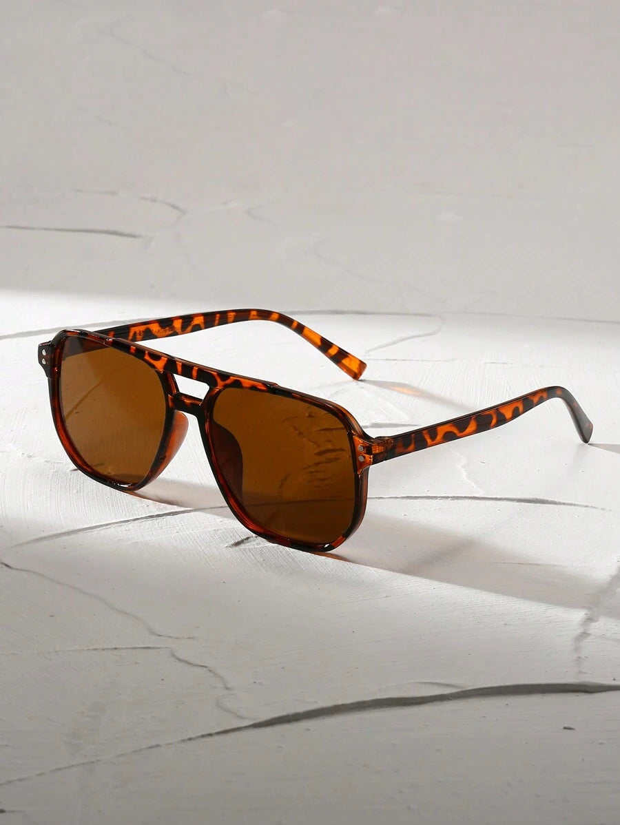 Lunettes de soleil homme à pont clé