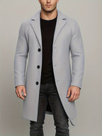 Manteau homme à revers boutonné