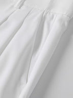 Pantalon homme large à pinces taille haute