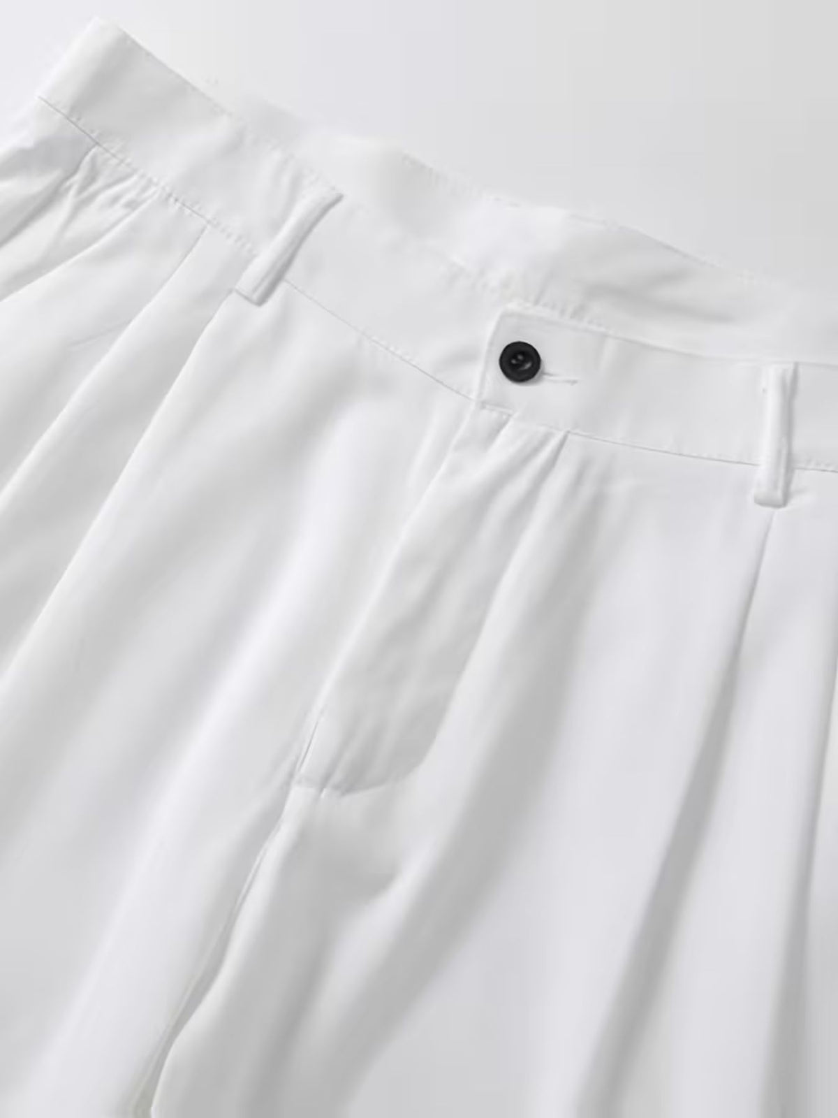Pantalon homme large à pinces taille haute