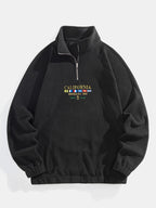 Sweat homme col montant demi-zip manches raglan