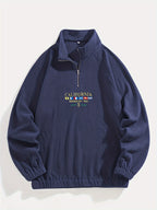 Sweat homme col montant demi-zip manches raglan