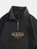Sweat homme col montant demi-zip manches raglan