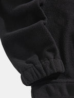 Sweat homme col montant demi-zip manches raglan
